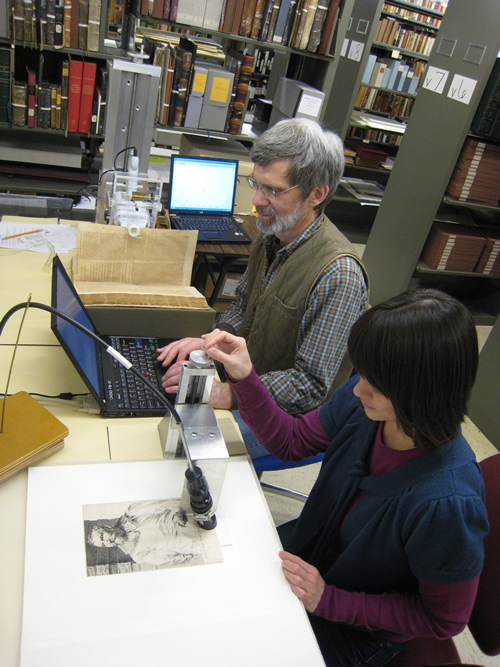 Tim Barrett and Jessica White analyzing specimens using the XRF and UV-VIS-NIR instrumentation